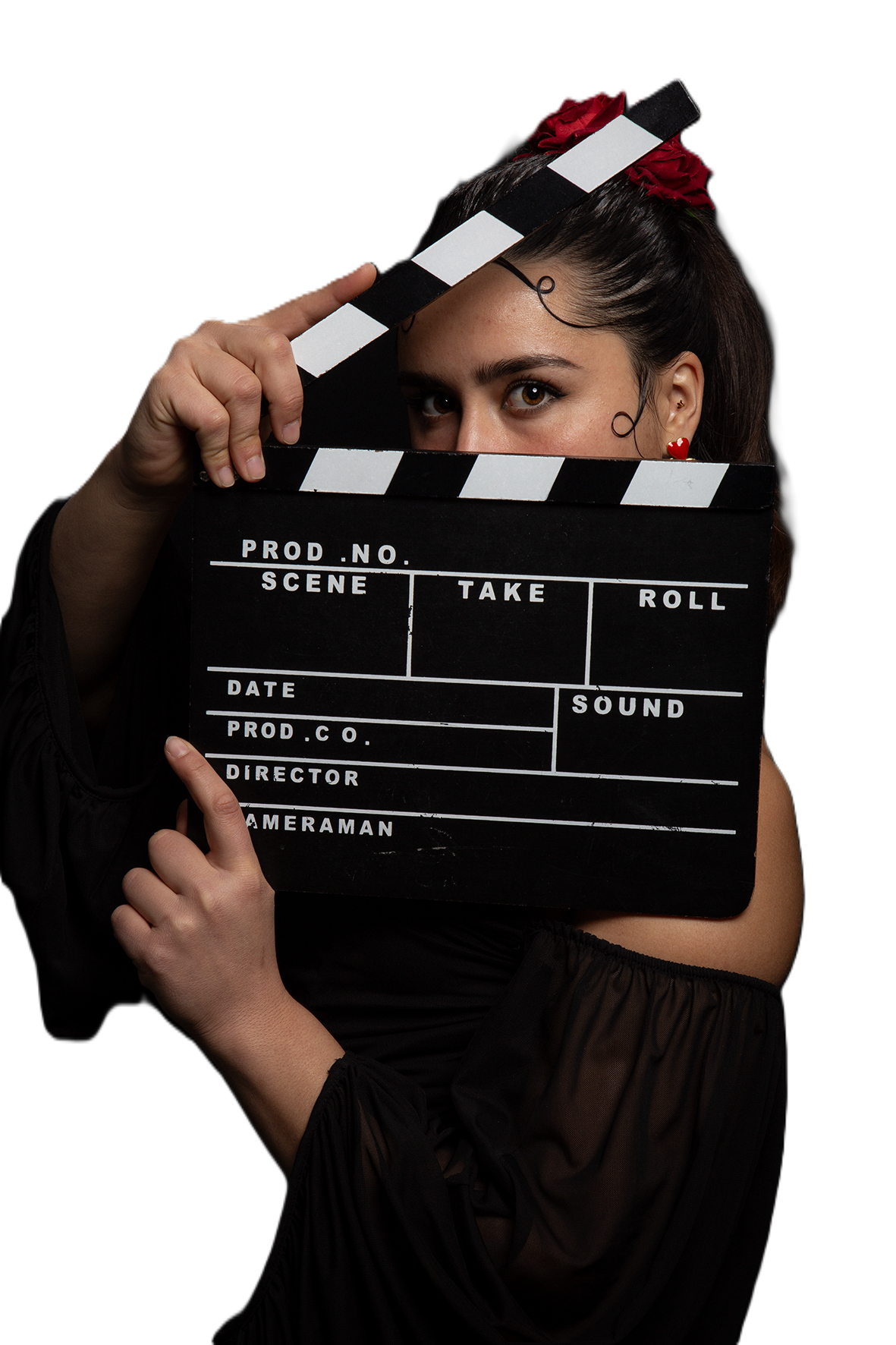 Victoria Rosa, productora audiovisual con IA en Málaga, con una claqueta de cine